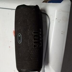 A JBL Bluetooth speaker
